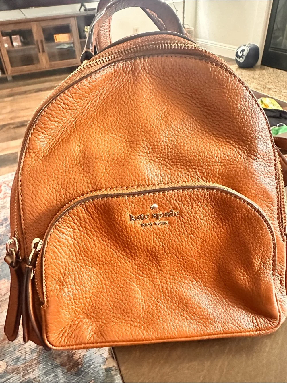Kate spade pebbled leather mini back pack in camel
